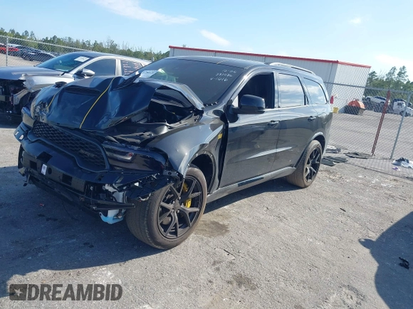 2024 Dodge Durango SRT 392 Premium with VIN 1C4SDJGJ6RC221616, listed as a IAAI auction lot 41280570 with 2,169 mi miles and . Bid and sale history available at DreamBid. Image 2.