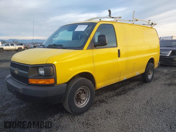 2014 Chevrolet Express Cargo Van with VIN 1GCWGFCA7E1150041, listed as a IAAI auction lot 41387426 with 185,480 mi miles. Bid and sale history available at carsss.com. Image 2.