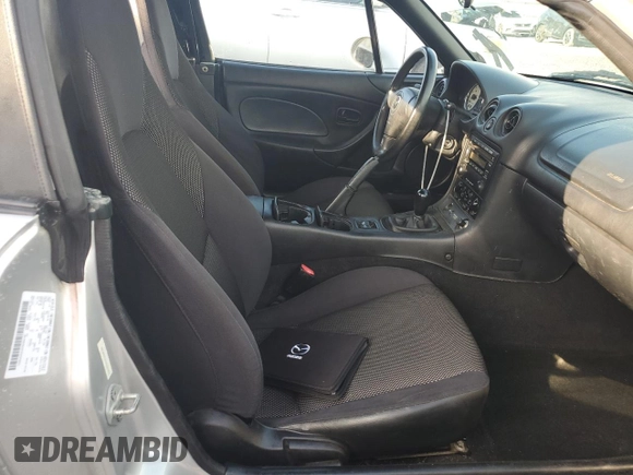 2002 Mazda MX-5 Miata Cloth with VIN JM1NB353420220801, listed as a Copart auction lot 61808645 with 116,451 mi miles and Salvage title. Bid and sale history available at DreamBid. Image 10.