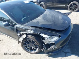 2019 Tesla Model 3 Mid Range with VIN 5YJ3E1EA0KF509547, listed as a IAAI auction lot 40720566 with 41,655 mi miles and . Bid and sale history available at DreamBid. Image 6.