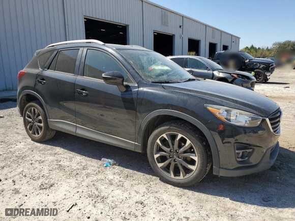 2016 Mazda CX-5 Grand Touring with VIN JM3KE2DY6G0842137, listed as a Copart auction lot 48769485 with 135,875 mi miles and Salvage Title. Bid and sale history available at carsss.com. Image 4.