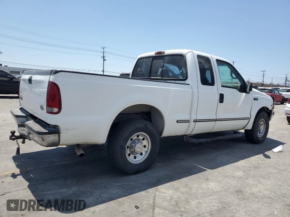1999 Ford F-250 XL with VIN 1FTNX20L8XEB01923, listed as a Copart auction lot 65404495 with 383,297 mi miles and Salvage title. Bid and sale history available at DreamBid. Image 3.