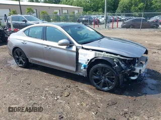 2023 Genesis G70 2.0T with VIN KMTG34TA2PU121151, listed as a IAAI auction lot 42425161 with 19,646 mi miles and . Bid and sale history available at DreamBid. Image 1.