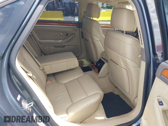2007 Audi A8 with VIN WAULV44E57N009945, listed as a IAAI auction lot 42400577 with 186,607 mi miles and . Bid and sale history available at DreamBid. Image 8.