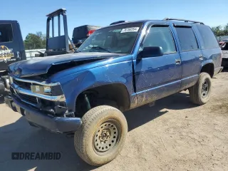 2000 Chevrolet Tahoe Z71 with VIN 1GNEK13R1YR134093, listed as a Copart auction lot 76780264 with 198,834 mi miles and Salvage title. Bid and sale history available at DreamBid. Image 1.