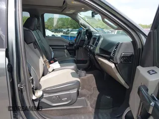 2015 Ford F-150 XLT with VIN 1FTEW1EG3FFB19022, listed as a IAAI auction lot 42452866 with 210,889 mi miles and . Bid and sale history available at DreamBid. Image 5.