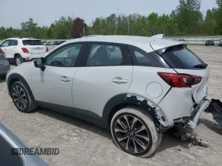 2019 Mazda CX-3 Touring z VIN JM1DKFC76K1451342, wystawiony jako Copart lot #58413935 z przebiegiem 21 391 mil mil oraz Szkoda całkowita • Salvage title. Historia ofert i sprzedaży dostępna na DreamBid. Obrazek 2.