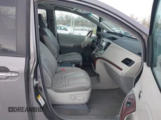2011 Toyota Sienna XLE AAS with VIN 5TDYK3DC5BS138281, listed as a IAAI auction lot 41381494 with 194,635 mi miles and . Bid and sale history available at DreamBid. Image 5.