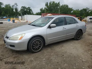 2006 Honda Accord LX with VIN 1HGCM663X6A045845, listed as a Copart auction lot 59719475 with 217,139 mi miles and Salvage title. Bid and sale history available at DreamBid. Image 1.