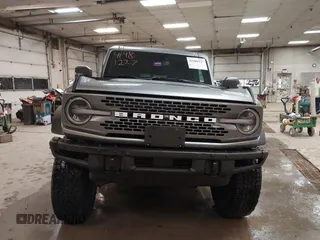 2023 Ford Bronco z VIN 1FMEE5DP2PLB55066, wystawiony jako IAAI lot #41981227 z przebiegiem 16 137 mil mil oraz . Historia ofert i sprzedaży dostępna na DreamBid. Obrazek 12.