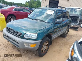 1998 Toyota RAV4 with VIN JT3HP10V5W7089021, listed as a IAAI auction lot 42739970 with 198,329 mi miles and . Bid and sale history available at DreamBid. Image 2.