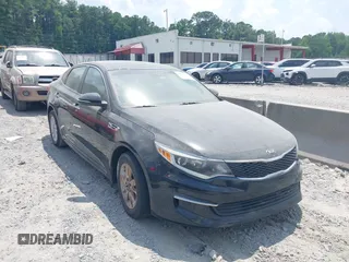 2018 Kia Optima LX with VIN 5XXGT4L39JG183529, listed as a IAAI auction lot 42690883 with 74,256 mi miles and . Bid and sale history available at DreamBid. Image 1.