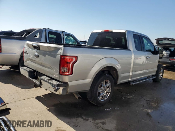 2015 Ford F-150 XL with VIN 1FTEX1C88FFC26544, listed as a Copart auction lot 48242705 with 124,731 mi miles and Salvage Title. Bid and sale history available at carsss.com. Image 3.