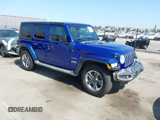 2018 Jeep Wrangler Unlimited Sahara z VIN 1C4HJXEG2JW211116, wystawiony jako IAAI lot #42250718 z przebiegiem 67 771 mil mil oraz . Historia ofert i sprzedaży dostępna na DreamBid. Obrazek 1.