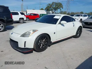 2004 Nissan 350Z Touring with VIN JN1AZ34E74T064156, listed as a IAAI auction lot 41498213 with 148,370 mi miles. Bid and sale history available at carsss.com. Image 2.