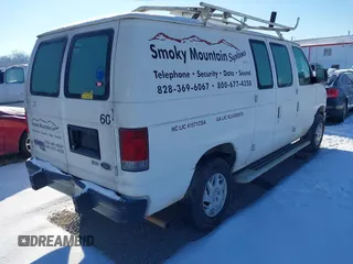 2012 Ford Econoline Cargo Recreational with VIN 1FTNE2EW9CDB05469, listed as a IAAI auction lot 41209022 with 162,890 mi miles and . Bid and sale history available at DreamBid. Image 4.