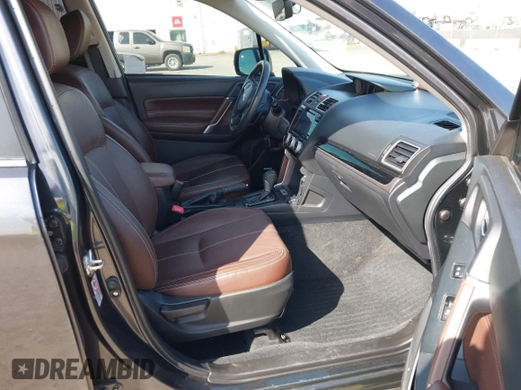 2018 Subaru Forester Touring with VIN JF2SJGWCXJH601162, listed as a IAAI auction lot 41760750 with 69,655 mi miles. Bid and sale history available at carsss.com. Image 5.