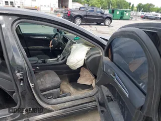 2015 Ford Fusion SE z VIN 3FA6P0H71FR242592, wystawiony jako IAAI lot #42255825 z przebiegiem Nie podano mil oraz . Historia ofert i sprzedaży dostępna na DreamBid. Obrazek 5.