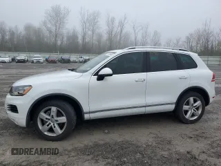 2012 Volkswagen Touareg Sport with VIN WVGEF9BP2CD010668, listed as a Copart auction lot 55306485 with 166,255 mi miles and Clean Title. Bid and sale history available at DreamBid. Image 1.