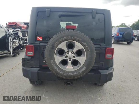 2017 Jeep Wrangler Unlimited Sahara with VIN 1C4BJWEG9HL633296, listed as a Copart auction lot 61387685 with 74,035 mi miles and Salvage title. Bid and sale history available at DreamBid. Image 6.