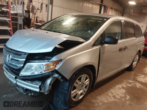 2012 Honda Odyssey LX with VIN 5FNRL5H27CB092988, listed as a IAAI auction lot 41933507 with 123,233 mi miles and . Bid and sale history available at DreamBid. Image 20.