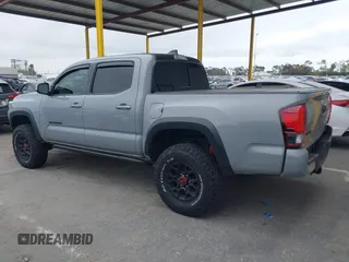 2021 Toyota Tacoma SR z VIN 5TFCZ5AN5MX281428, wystawiony jako IAAI lot #41893437 z przebiegiem 36 204 mil mil oraz . Historia ofert i sprzedaży dostępna na DreamBid. Obrazek 14.