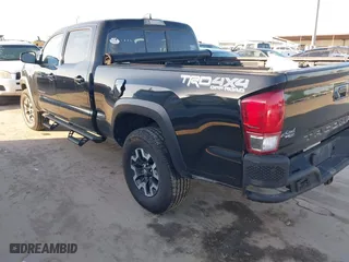 2016 Toyota Tacoma SR5 with VIN 3TMDZ5BN8GM004995, listed as a IAAI auction lot 41979497 with 91,227 mi miles. Bid and sale history available at carsss.com. Image 3.