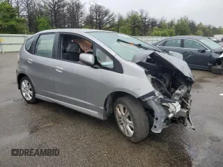 2010 Honda Fit Sport with VIN JHMGE8H40AC017384, listed as a Copart auction lot 58226445 with 138,453 mi miles and Salvage title. Bid and sale history available at DreamBid. Image 4.