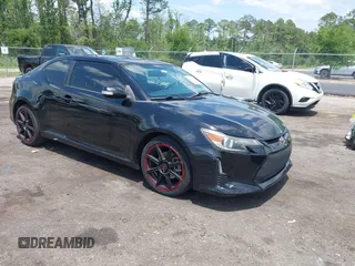 2016 Scion tC z VIN JTKJF5C77GJ020641, wystawiony jako IAAI lot #42351582 z przebiegiem 199 619 mil mil oraz . Historia ofert i sprzedaży dostępna na DreamBid. Obrazek 1.