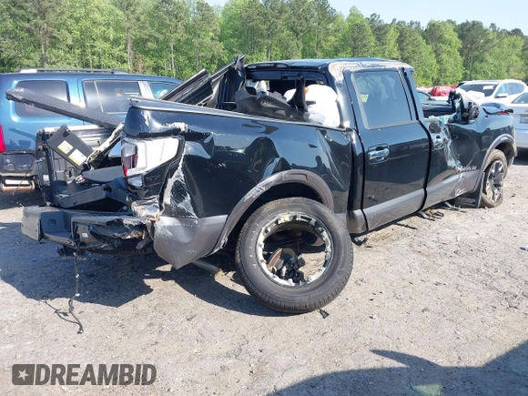 2021 Nissan Titan Pro-4X with VIN 1N6AA1ED4MN515673, listed as a IAAI auction lot 42028678 with 128,719 mi miles and . Bid and sale history available at DreamBid. Image 4.