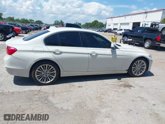 2014 BMW 3 Series 328i with VIN WBA3A5C54EP600398, listed as a IAAI auction lot 42665302 with 117,012 mi miles and . Bid and sale history available at DreamBid. Image 13.