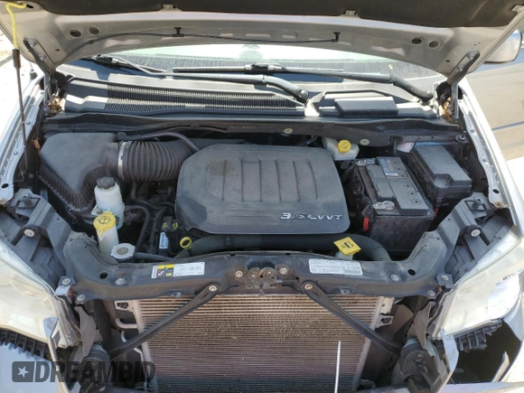 2013 Dodge Grand Caravan Crew with VIN 2C4RDGDG4DR726502, listed as a Copart auction lot 53258075 with 132,903 mi miles and Salvage Title. Bid and sale history available at DreamBid. Image 14.