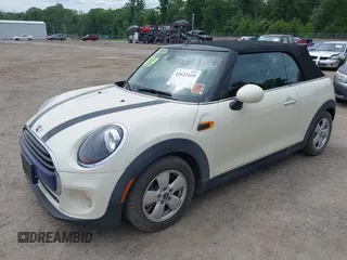 2019 MINI Convertible Cooper z VIN WMWWG5C52K3F79780, wystawiony jako IAAI lot #42622429 z przebiegiem 38 532 mil mil oraz . Historia ofert i sprzedaży dostępna na DreamBid. Obrazek 2.