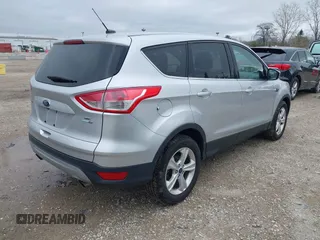 2016 Ford Escape SE with VIN 1FMCU9GX3GUA96262, listed as a IAAI auction lot 41915524 with 64,434 mi miles and . Bid and sale history available at DreamBid. Image 4.