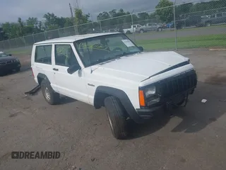 1995 Jeep Cherokee z VIN 1J4FJ27S9SL653741, wystawiony jako IAAI lot #42630267 z przebiegiem 232 994 mil mil oraz . Historia ofert i sprzedaży dostępna na DreamBid. Obrazek 1.