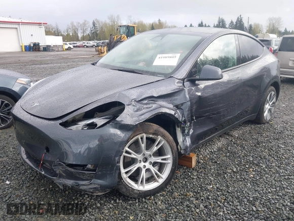 2023 Tesla Model Y Long Range with VIN 7SAYGAEE4PF871281, listed as a IAAI auction lot 41989805 with 15,501 mi miles. Bid and sale history available at carsss.com. Image 2.