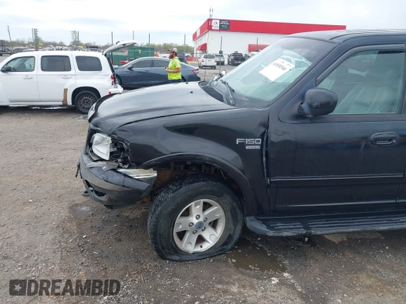 2002 Ford F-150 XLT with VIN 1FTRW08L32KD90202, listed as a IAAI auction lot 41850546 with 256,807 mi miles. Bid and sale history available at carsss.com. Image 17.