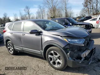 2018 Honda CR-V EX with VIN 2HKRW2H50JH691990, listed as a Copart auction lot 50433225 with 134,793 mi miles and Salvage Title. Bid and sale history available at DreamBid. Image 4.