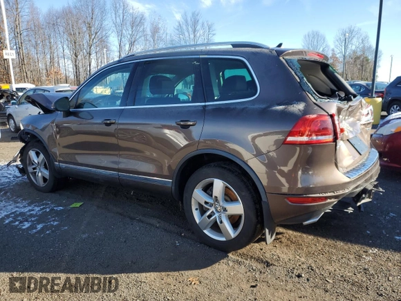 2013 Volkswagen Touareg Sport с VIN WVGEP9BP5DD003924, выставлен на аукционе Copart как лот 83310484 с пробегом Не указан миль и Списание • Salvage title. История ставок и продаж доступна на DreamBid. Изображение 2.