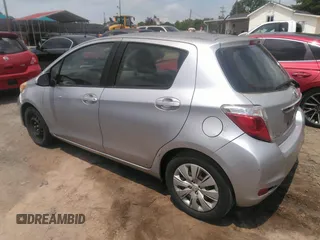 2012 Toyota Yaris L with VIN JTDKTUD35CD531056, listed as a IAAI auction lot 42169341 with 114,955 mi miles. Bid and sale history available at carsss.com. Image 3.