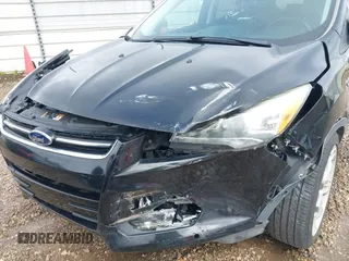 2016 Ford Escape Titanium with VIN 1FMCU0JX8GUA49619, listed as a IAAI auction lot 41743116 with 53,456 mi miles. Bid and sale history available at carsss.com. Image 6.