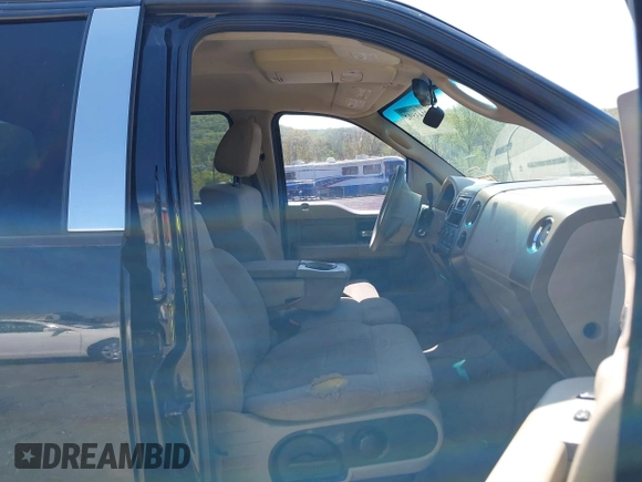 2005 Ford F-150 XLT with VIN 1FTRW12W65FB12867, listed as a IAAI auction lot 42143592 with 182,481 mi miles and . Bid and sale history available at DreamBid. Image 5.