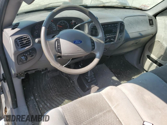 2003 Ford F-150 z VIN 2FTRX08W83CB03269, wystawiony jako Copart lot #63915625 z przebiegiem 150 127 mil mil oraz Czysty tytuł • Clean title. Historia ofert i sprzedaży dostępna na DreamBid. Obrazek 8.