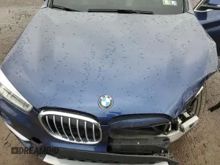 2017 BMW X1 xDrive28i with VIN WBXHT3C3XH5F69573, listed as a Copart auction lot 52719715 with 93,981 mi miles and Salvage Title. Bid and sale history available at DreamBid. Image 12.