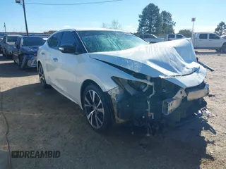 2017 Nissan Maxima Platinum z VIN 1N4AA6AP4HC412504, wystawiony jako IAAI lot #41251614 z przebiegiem 150 007 mil mil oraz . Historia ofert i sprzedaży dostępna na DreamBid. Obrazek 1.