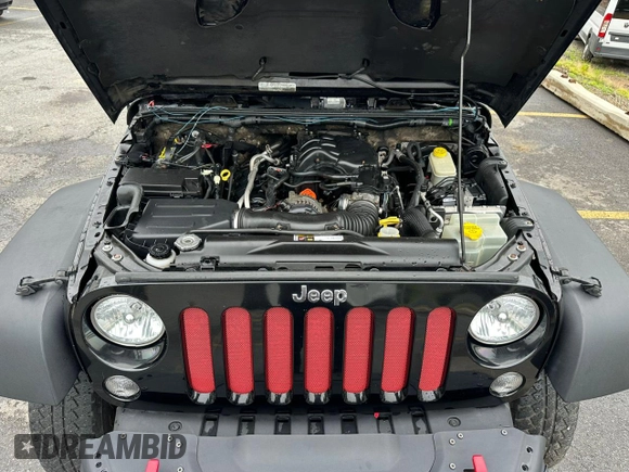 2015 Jeep Wrangler Unlimited Rubicon z VIN 1C4BJWFG2FL541572, wystawiony jako Copart lot #61723875 z przebiegiem 163 169 mil mil oraz Czysty tytuł • Clean title. Historia ofert i sprzedaży dostępna na DreamBid. Obrazek 5.