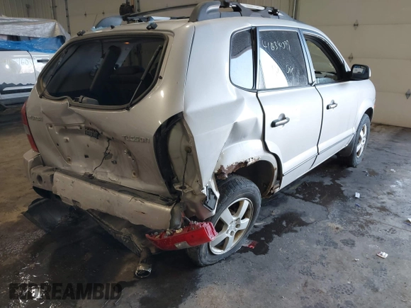 2005 Hyundai Tucson GL with VIN KM8JM12B25U171048, listed as a IAAI auction lot 41634099 with 188,086 mi miles. Bid and sale history available at carsss.com. Image 4.