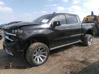 2019 Chevrolet Silverado 1500 High Country with VIN 1GCUYHEL1KZ360808, listed as a IAAI auction lot 42106243 with 158,061 mi miles. Bid and sale history available at carsss.com. Image 2.