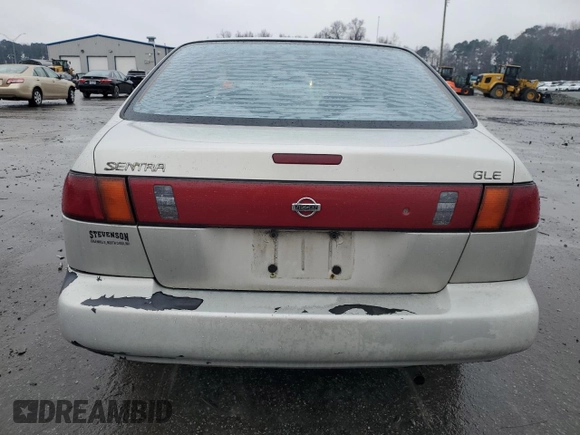 1996 Nissan Sentra XE z VIN 1N4AB41D2TC767557, wystawiony jako Copart lot #42553245 z przebiegiem 148 514 mil mil oraz Szkoda całkowita • Salvage title. Historia ofert i sprzedaży dostępna na DreamBid. Obrazek 6.
