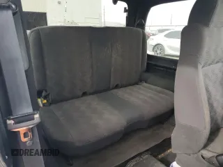 2003 Jeep Wrangler SE with VIN 1J4FA29113P351844, listed as a Copart auction lot 81411324 with 53,525 mi miles and Salvage title. Bid and sale history available at DreamBid. Image 10.